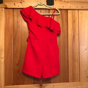 Red romper.